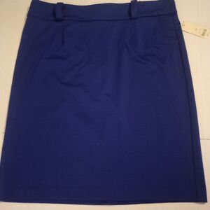 Electric blue stretchy knee length skirt with belt loops and zipper closure